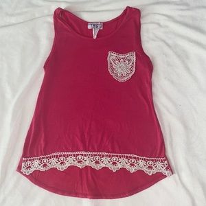 Girls size 12/14. Pink shirt with lace trim.